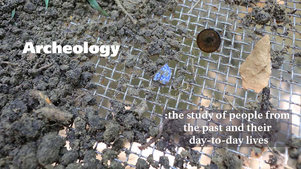 Photo of dirt with pottery sherd in center, text on photo "Archeology is the study of people from the past and their day-to-day lives".