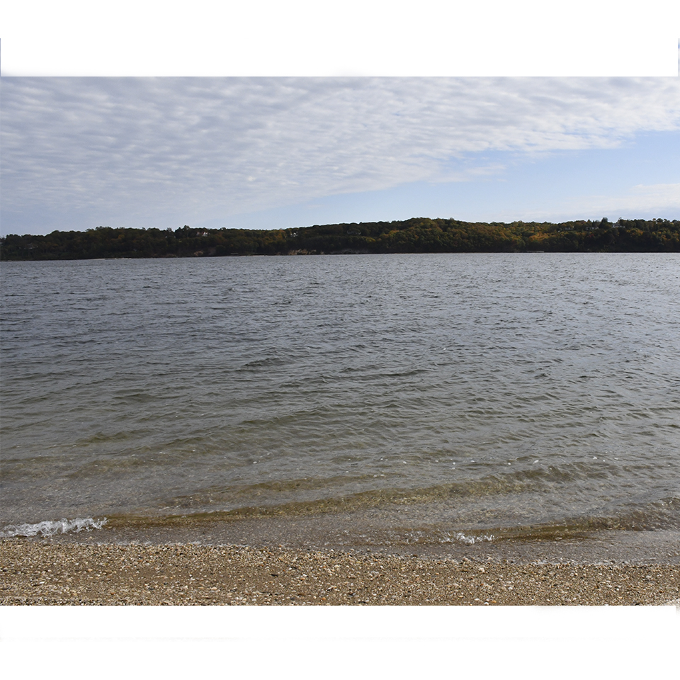 Theodore Roosevelt in a boat on Cold Spring Harbor Shore