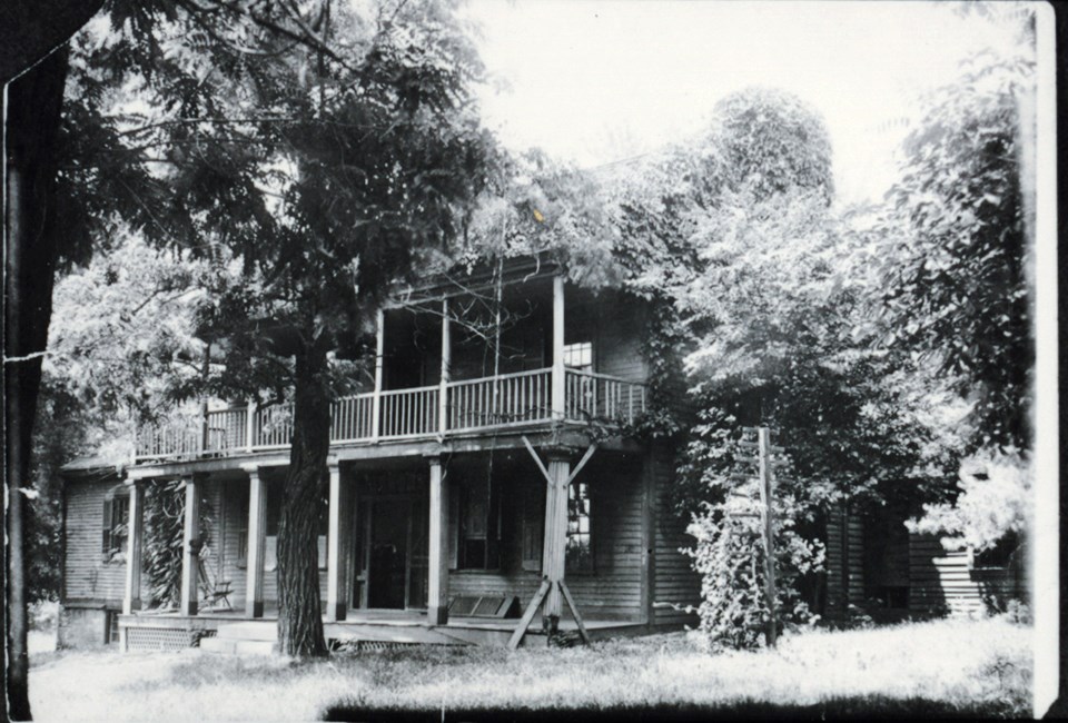 Black and white historic photo of a two-story house, White Haven