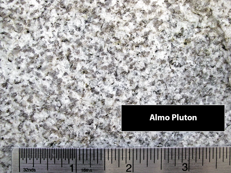 Light gray granite with evenly dispersed small crystals.