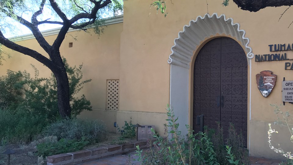 historic photo of scallop motif over church front door