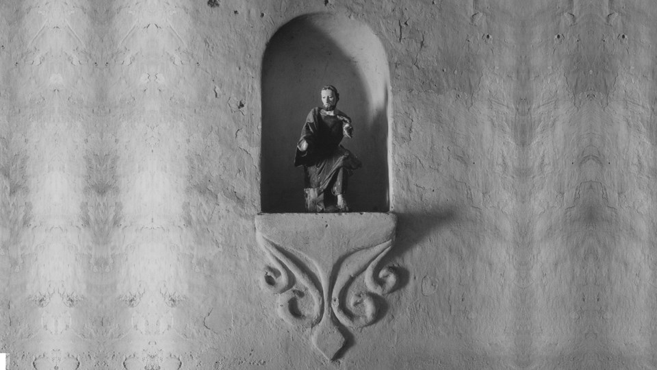 historic image of niche and pedestal with carved saint