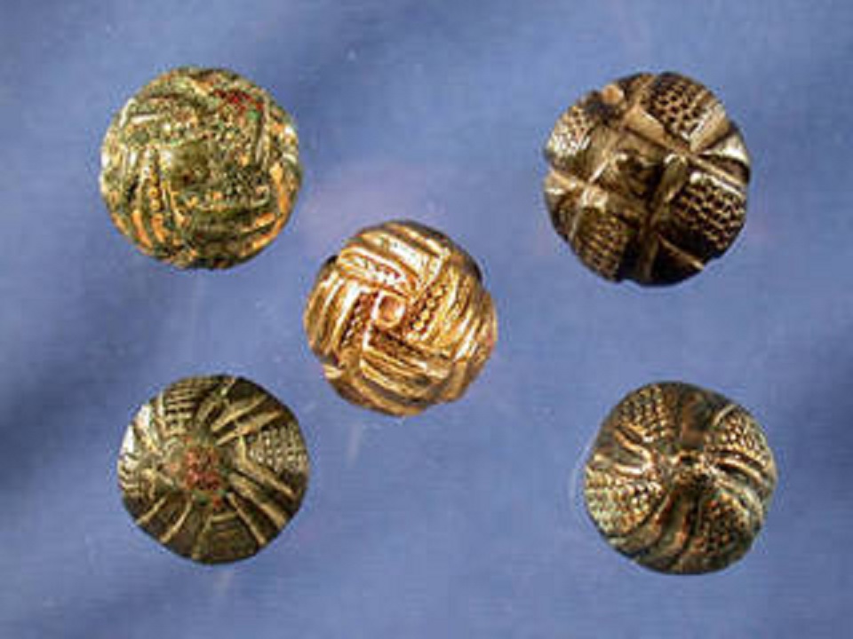 What Is It? These brass buttons were worn on the jackets of Menendez soldiers.