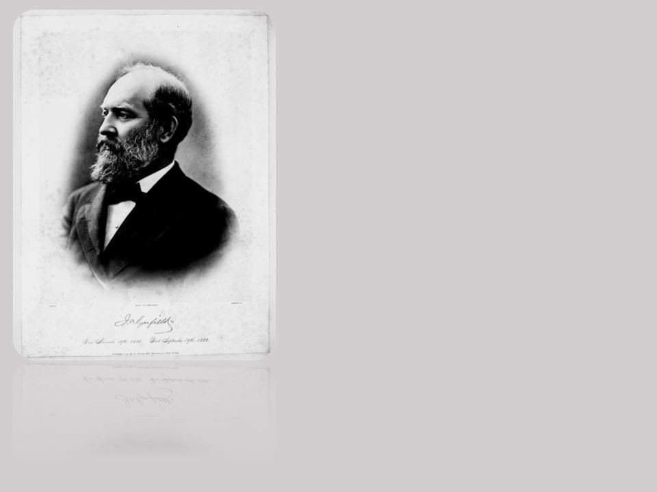 American flag waving in the breeze, the sun shining through the stars