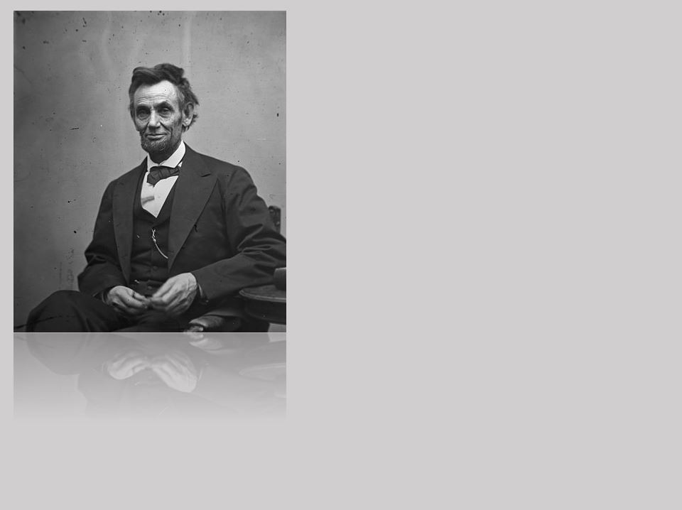 American flag waving in the breeze, the sun shining through the stars