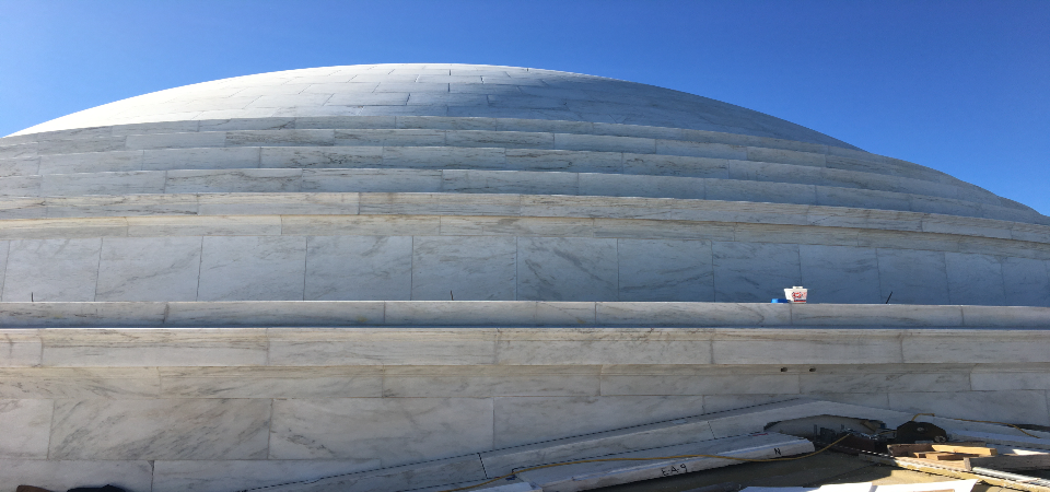 A black substance is visible on the dome of the Thomas Jefferson Memorial.