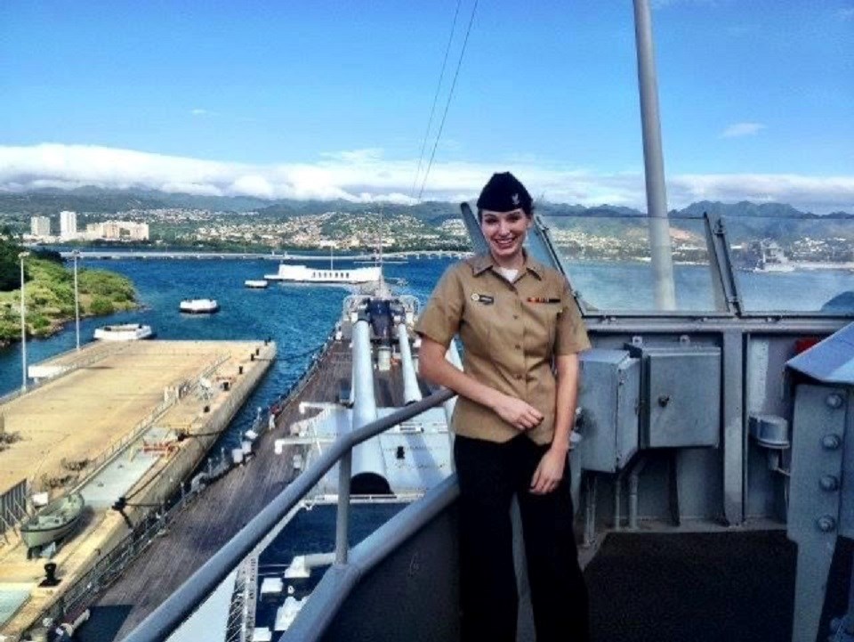 Abbie Johnson in military uniform near the ocean