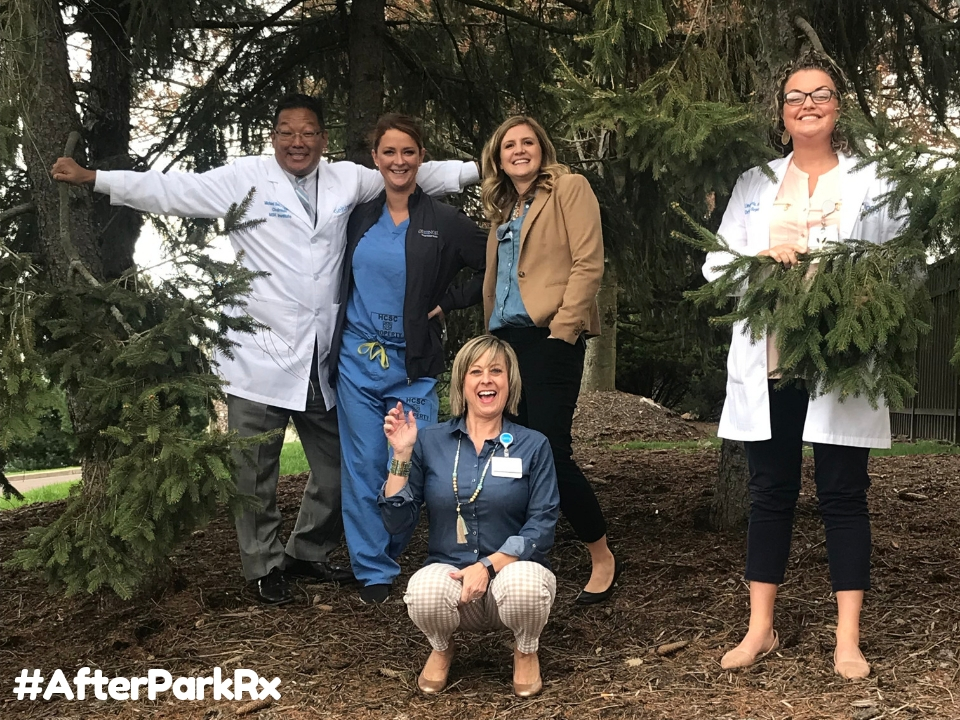 Doctors and medical staff sitting around table