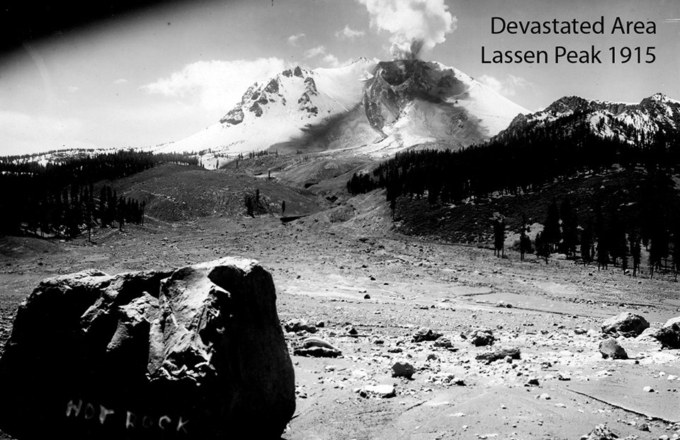 black and white photograph of a recent eruption showing baren slope with peak in the background