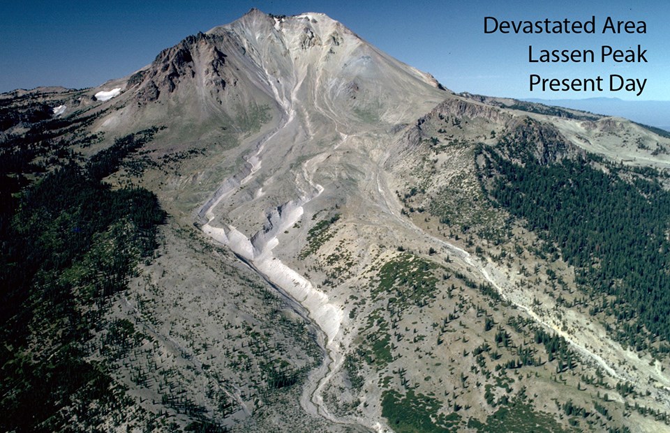 black and white photograph of a recent eruption showing baren slope with peak in the background
