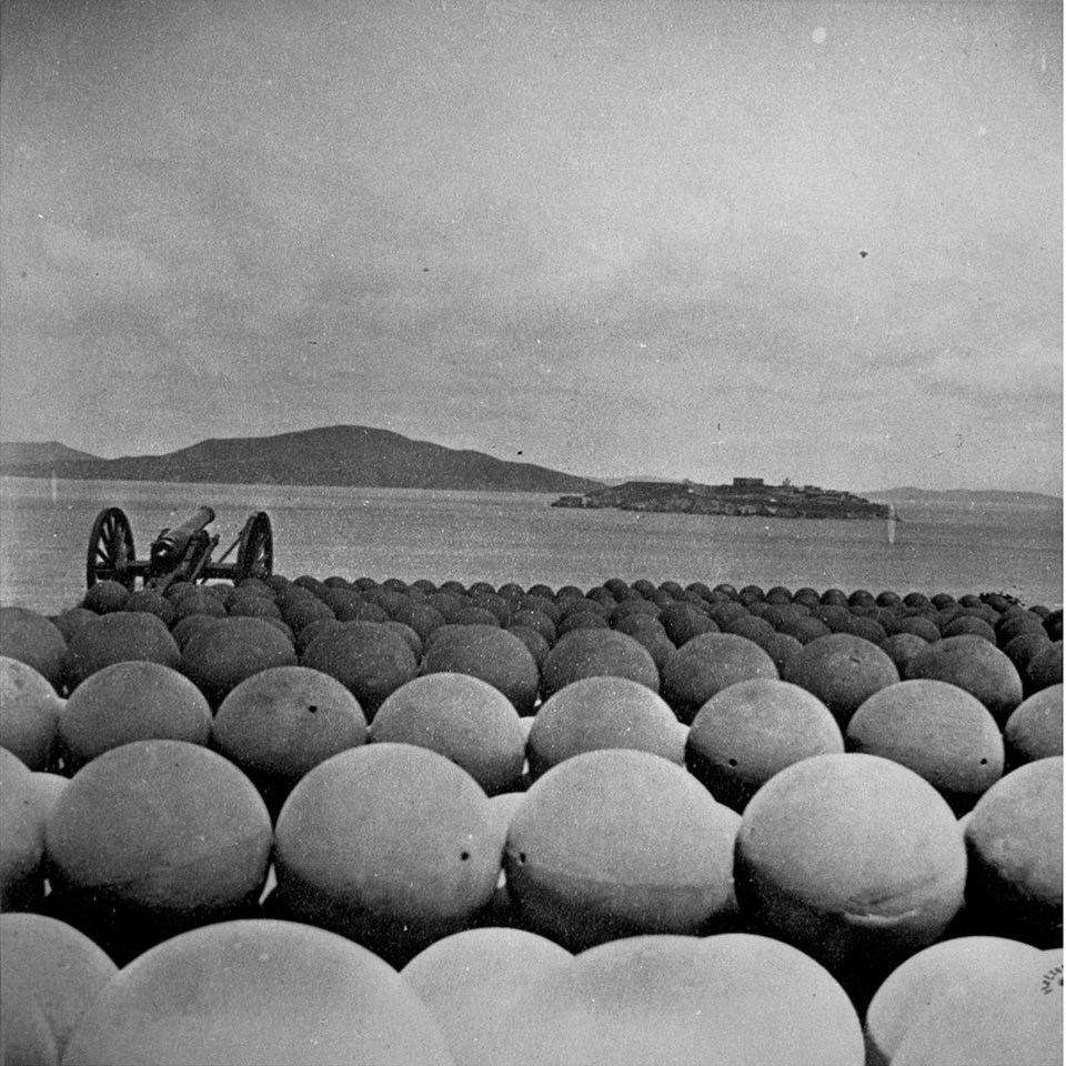 Photo of Alcatraz over Cannonballs at Fort Mason 1869