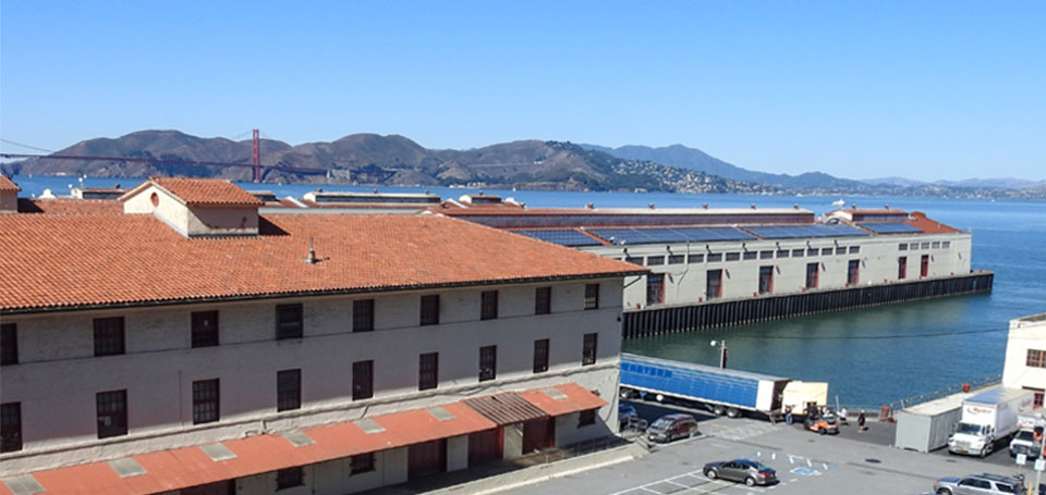 Photo of Fort Mason Pier 2 c1915. USAT Logan in Dock