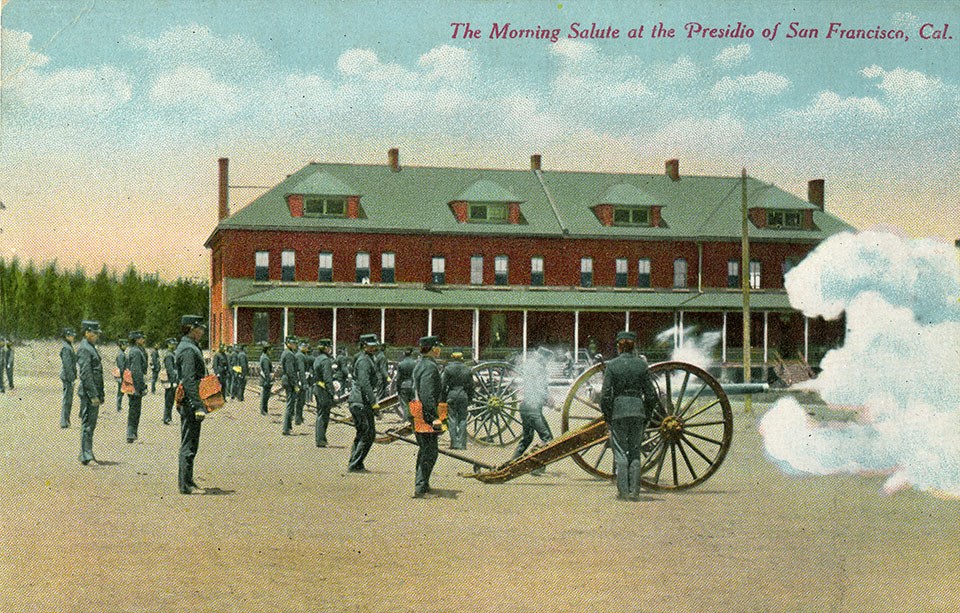 Colorized postcard photo of the Parade Grounds with artillery c1900