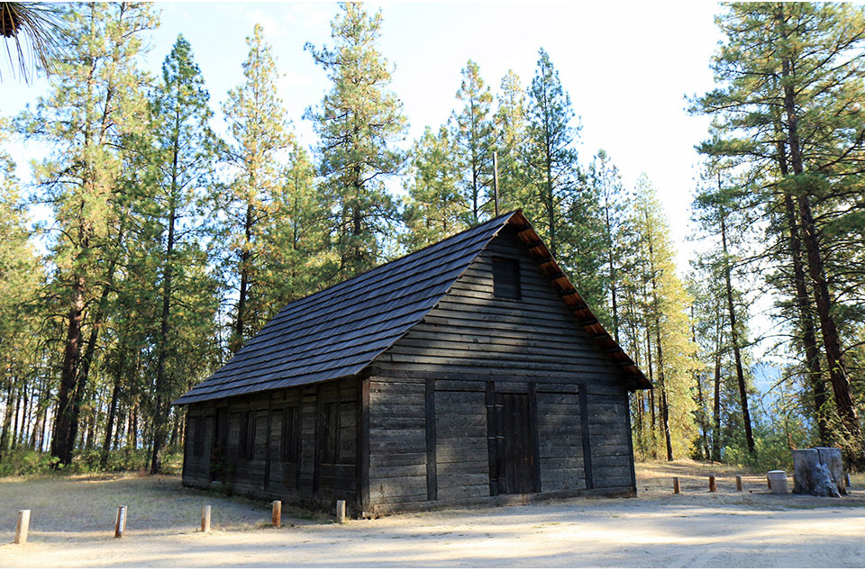 Visitors pose in front of St. Paul's Mission in 1888