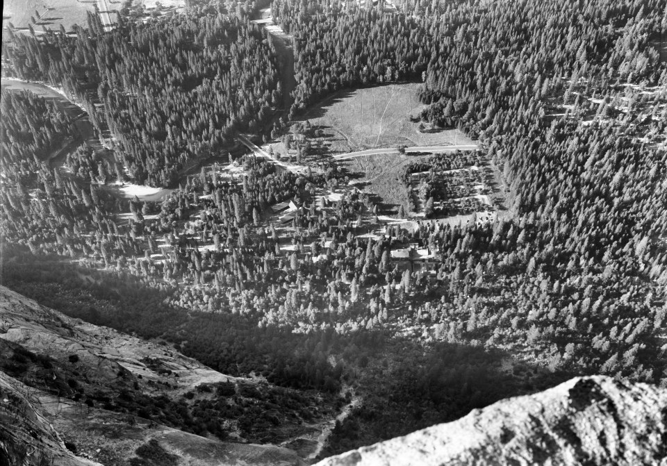 View of the valley floor from atop a high cliff.