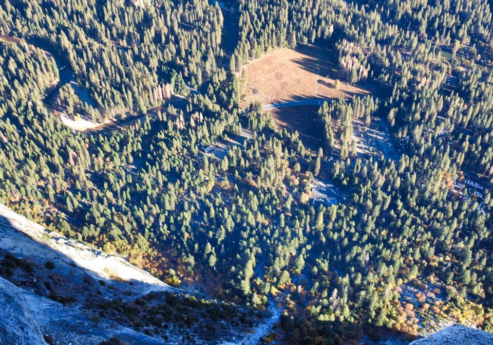 View of the valley floor from atop a high cliff.