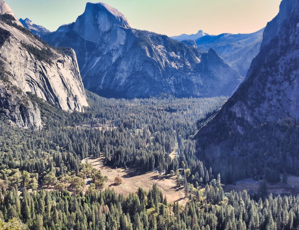 View of the Valley floor with granite mountains in background.