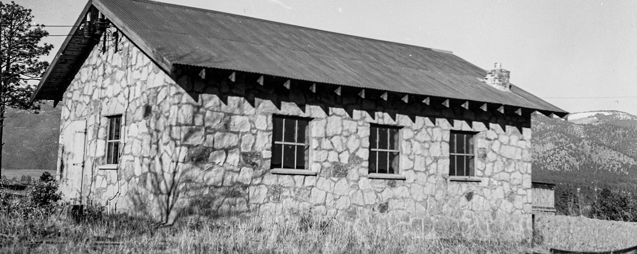Black and white photo of a stone building.