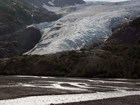 a large glacier feeding a braided river