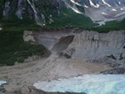 mountain with its base eroded away