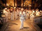 Party-goers dressed in white attend the annual White Party Week