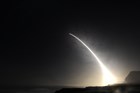 An Minuteman III missile launches during a nighttime test (U.S. Air Force Photo by Michael Peterson)