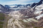 A large outwash plain sits in front of the Tana Glacier (Wrangell-St. Elias National Park, AK)