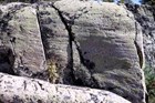 A large striated rock in Yellowstone National Park (WY-ID-MT)