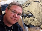 scientist with large fossil image
