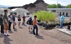 People listening to a lecture about native plants