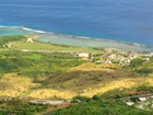 green slopes above seashore