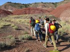 youth group hiking a desert trail