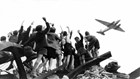 German children wave at an American airplane