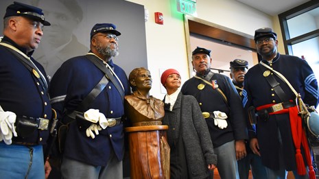 Reenactors portraying Harriet Tubman and the 54th U.S. Army Regiment