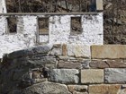 rock wall detail showing local stone types