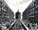 Black and white photo of ship launching at Kaiser Shipyard.