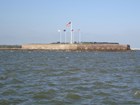 view across water to fort