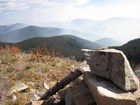 view of mountain ridges and smoke