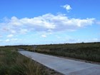boardwalk crosses coastal prairie
