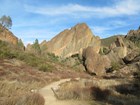trail leading toward rocks and cliffs