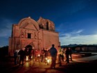mission and visitors at dusk