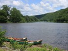 canoes on river bank