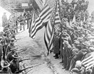 Militia point their bayonets at strikers in Lawrence, 1912. Public Domain.