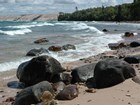 beach with sand, cobbles, and boulders