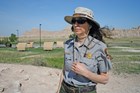 Woman in ranger uniform with blue skies behind her