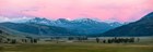 A photo of a pink sunset over the Beartooth range in early spring.