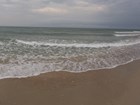 waves breaking on sandy beach