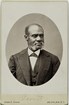Black and white portrait of an African-American man in a suit