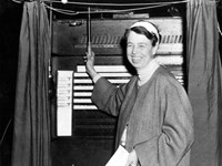 Eleanor Roosevelt n in a voting booth.