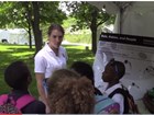 Working with the public, sharing information about bats with a group of school children